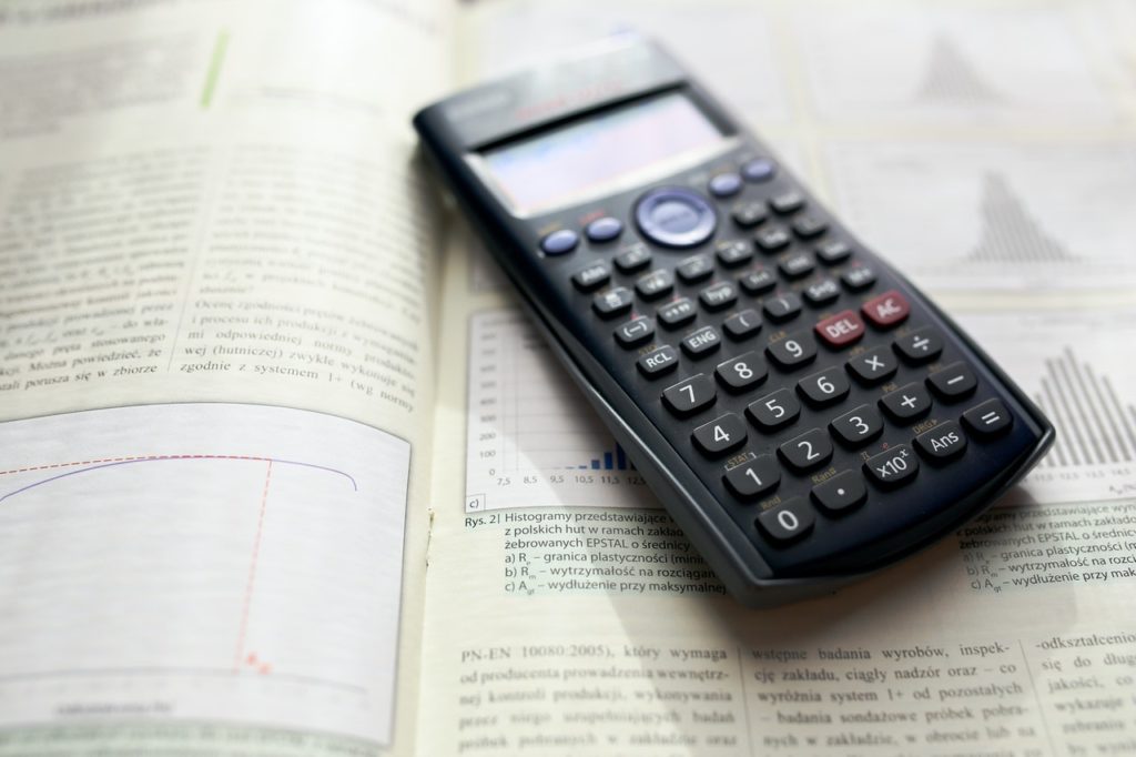 Calculator on a math book